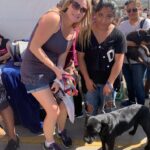 Janice Overbeck assists local residents of Mexico with the free spay/neuter event.